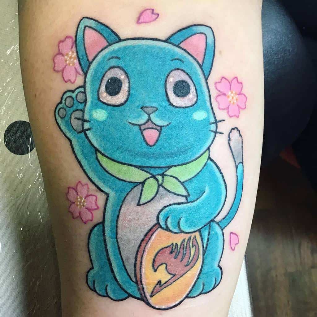 This tattoo features Happy from *Fairy Tail* as a lucky cat, holding a coin with the guild emblem, surrounded by cherry blossoms.