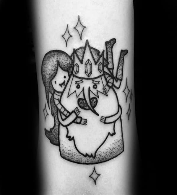 Black ink Adventure Time tattoo of Marceline hugging Ice King with sparkles around them, symbolizing their emotional bond, placed on the arm.