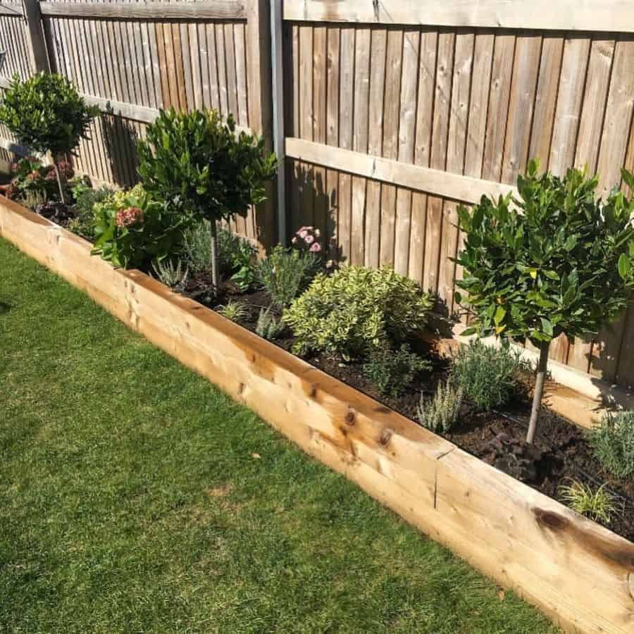 raised garden bed ideas wood retaining wall