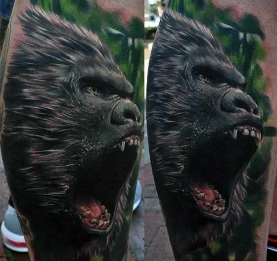 Agressive 3d Guys Gorilla Tattoo With Green Forest Background
