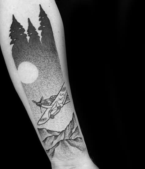 Airplane Flying Over The Mountains At Night Travel Mens Forearm And Wrist Tattoo