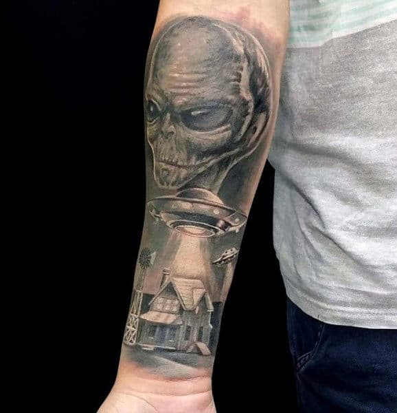 Alien With Spacecraft And House Mens Forearm Tattoo