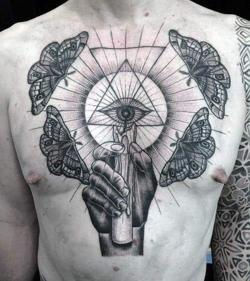 All Seeing Eye Moths Around Lit Candle Mens Chest Tattoos