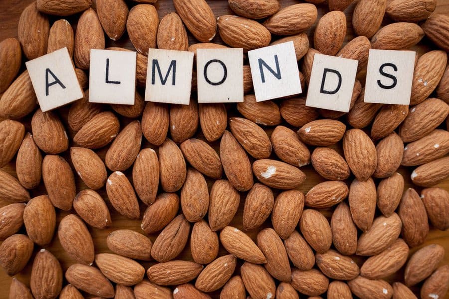 almond nuts with the word