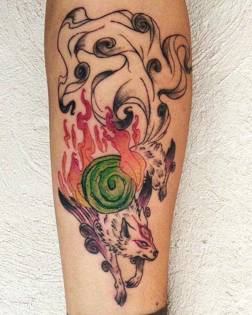 Amaterasu tattoo with colorful swirling flames and divine celestial mirror in dynamic motion