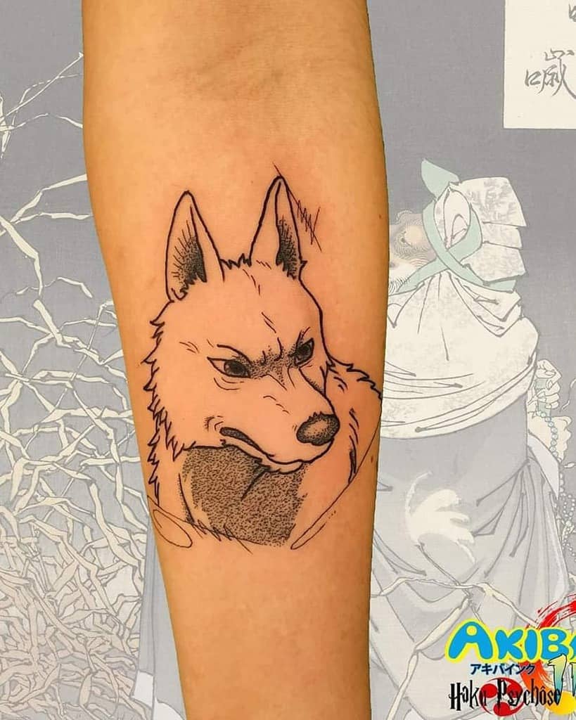 Bold Okami tattoo featuring a fierce wolf with sharp linework and subtle shading, inspired by traditional Japanese aesthetics