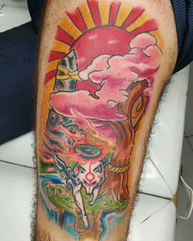 Vibrant Okami tattoo of Amaterasu running beneath a radiant red sun, with cherry blossoms, sacred trees, and fiery divine energy