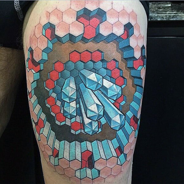 Geometric tattoo on leg with hexagonal patterns and 3D crystal shapes in red, blue, and gray colors