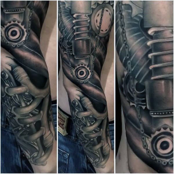 Tattoo sleeve featuring intricate biomechanical designs on an arm