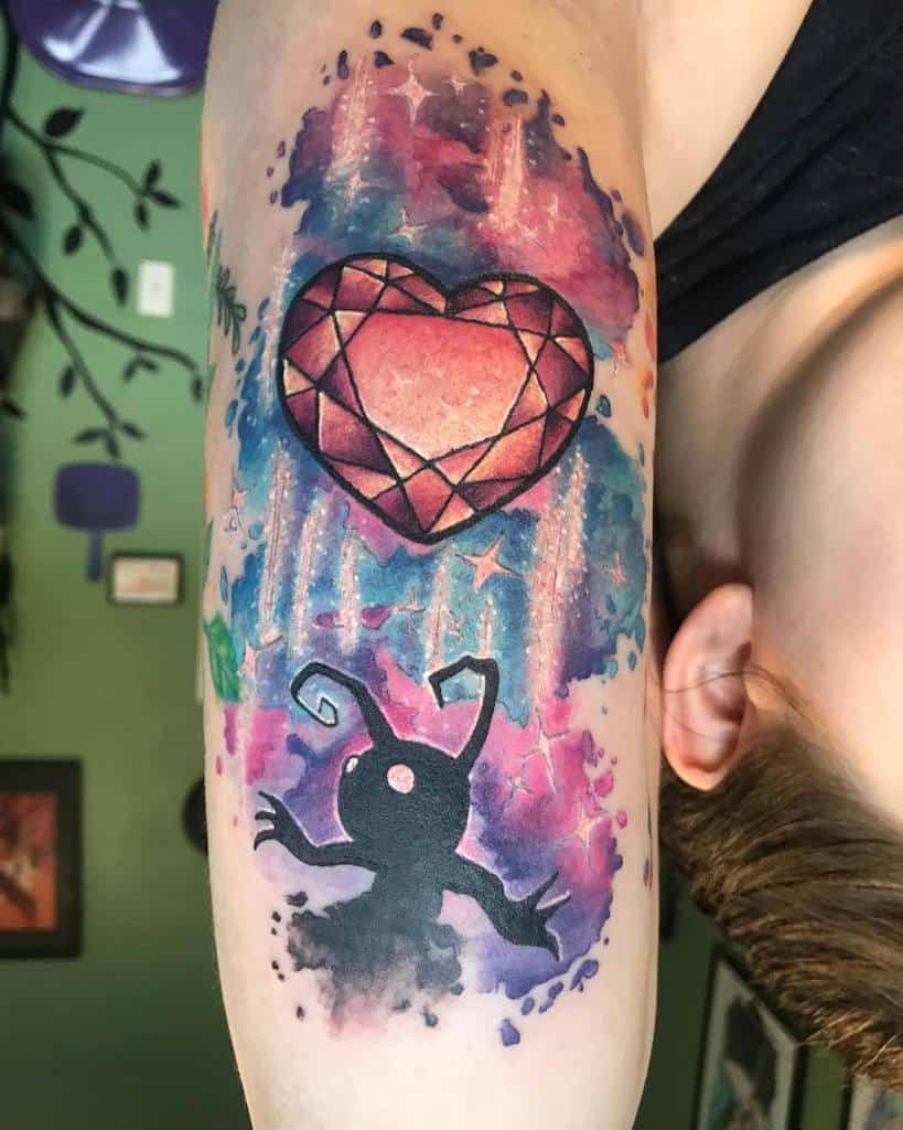 Vibrant Kingdom Hearts tattoo featuring a Shadow Heartless reaching toward a glowing faceted heart, set against a cosmic watercolor background.