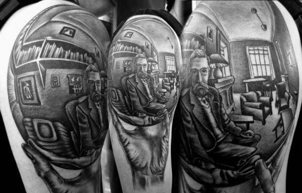 Tattoo of MC Escher’s “Hand with Reflecting Sphere,” showing a man in a room reflected in a perfectly detailed glass orb.
