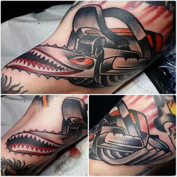 Chainsaw tattoo with a stylized mechanical design and shark teeth detail, featuring bold lines and red, black, and gray shades.