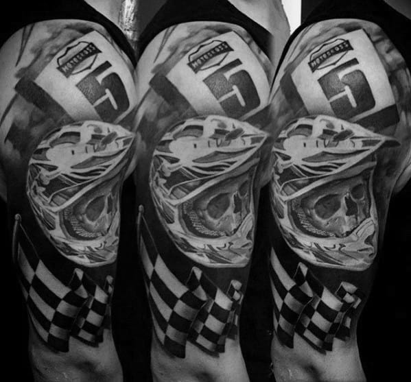 Checkered flag tattoo featuring a skull in a racing helmet, bold shading, and a number plate, symbolizing speed and victory.