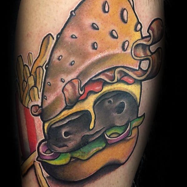 Cheeseburger tattoo with vivid colors and detailed shading, paired perfectly with fries on skin