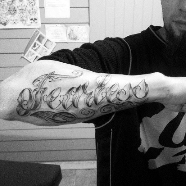 Amazing Mens Fearless Tattoo Designs On Outer Forearm