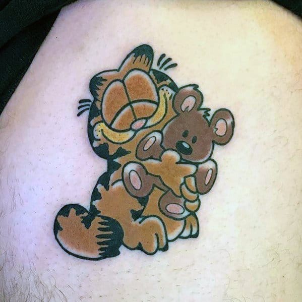 Garfield hugging a teddy bear tattoo with bold outlines and soft shading, perfect for a nostalgic and playful design.