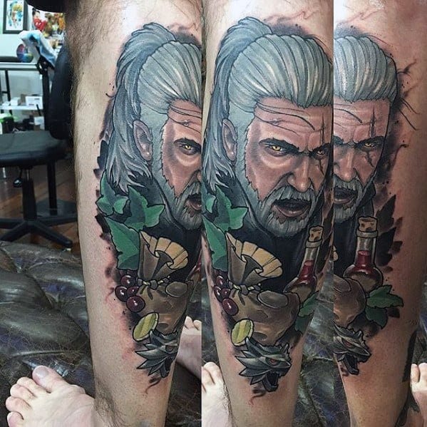 Geralt tattoo featuring a detailed portrait with silver hair, intense gaze, and alchemy-themed elements like potions, herbs, and mushrooms.
