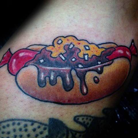 Hot dog tattoo featuring a sausage with melted cheese and dripping sauce on a soft bun, with a red ribbon at the ends.