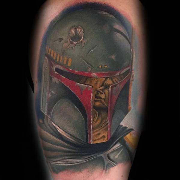 Realistic color tattoo of Boba Fett in battle-worn Mandalorian armor, featuring red helmet details and intense facial expression.