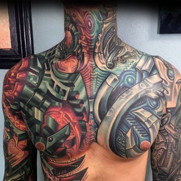 A person with a detailed, colorful biomechanical tattoo covering their chest and shoulders