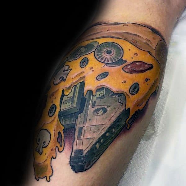 Millennium Falcon tattoo design for men featuring detailed linework and sci-fi elements on the upper arm.