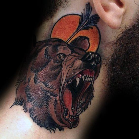 Neo-traditional bear tattoo on the neck featuring a roaring bear with bold shading, a sunset background, and an arrow piercing through.