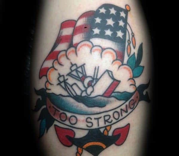 Shipwreck tattoo with an American flag, sinking ship, ocean waves, and a banner that reads “Too Strong” in traditional style.
