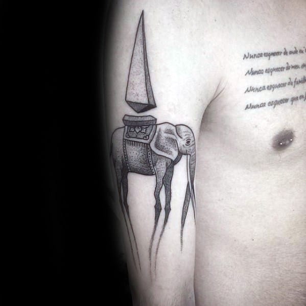 Black and grey Salvador Dali-style tattoo of an elephant with long, thin legs carrying a sharp pyramid structure on its back.