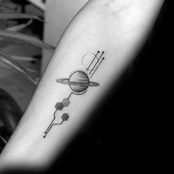 Minimalist Saturn tattoo design for men featuring geometric lines, hexagons, and orbital elements in black ink on the forearm.