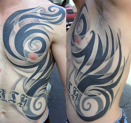 Amazing Mens Shaded And Solid Black Ink Tribal Ribs Tattoos
