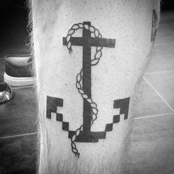 Pixel-style black anchor tattoo with a wrapped rope, combining a modern digital aesthetic with traditional nautical symbolism of stability and strength.