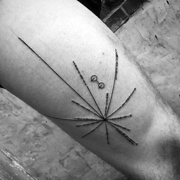 Minimalist geometric tattoo with lines and a pulsar map circle on a person's thigh