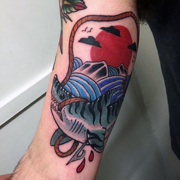 Tiger shark tattoo with bold lines, mountains, red sun, and traditional style waves, with dripping blood for a dramatic effect.