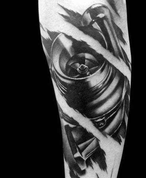 Realistic mechanical-themed tattoo on the forearm with a torn skin effect, revealing intricate shading and depth, symbolizing strength and inner mechanics.