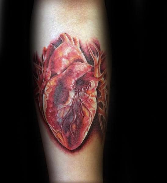 Amazing Mesn Red Realistic Heart Inner Forearm Tattoo