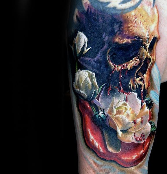 Colorful skull tattoo with roses and dripping red accents