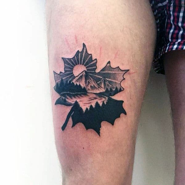 Amazing Small Maple Leaf Landscape Of Nature Thigh Tattoo On Male