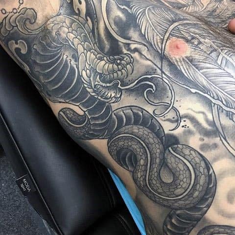 Amazing Spitting Cobra Mens Ribs Tattoos