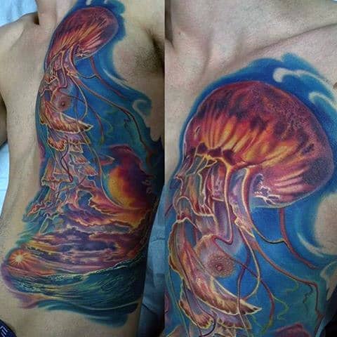 Amazing Sunlit Waters And Jellyfish Tattoo Male Torso