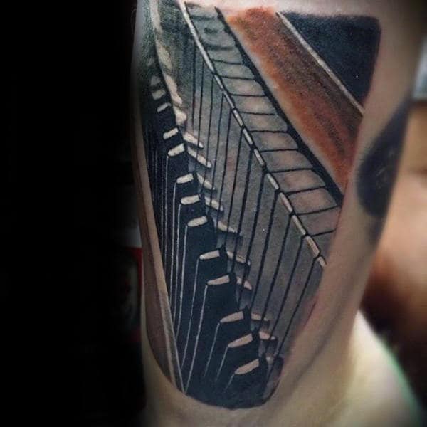 Amazing Tattoo Of 3d Piano Keys On Gentleman