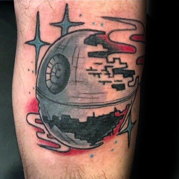Tattoo of a celestial sphere with stars, abstract red and blue accents, and a Death Star