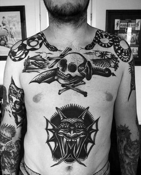 Amazing Traditional Skull With Crossbones And Dagger Tattoo On Gentlemans Chest