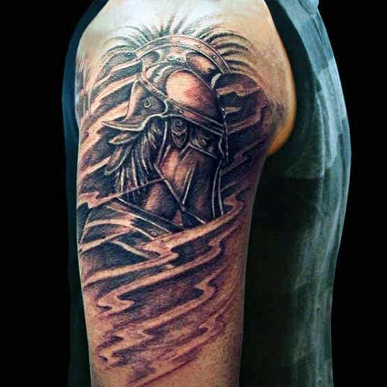 Tattoo of a warrior wearing a helmet on a person's upper arm