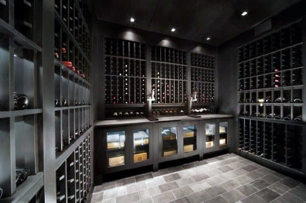Modern wine cellar with dark wood shelves filled with fine wine bottles, and a beautifully tiled floor