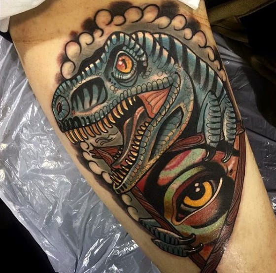 Amber Eyed Dinosaur And An Eye Tattoo Male Forearms