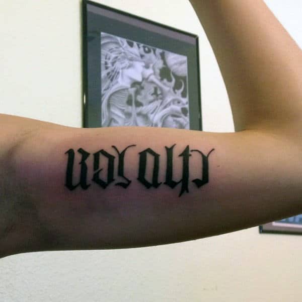 Ambigram Tattoo Ideas For Men On Bicep
