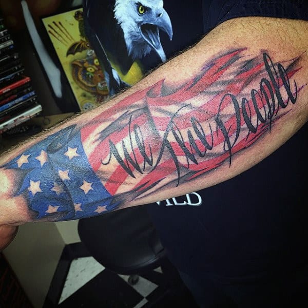 American Flag We The People Tattoo On Mans Forearm