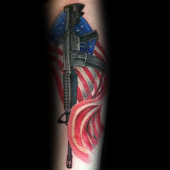 AR-15 tattoo with an American flag background, featuring bold red, white, and blue colors, symbolizing patriotism and Second Amendment rights.