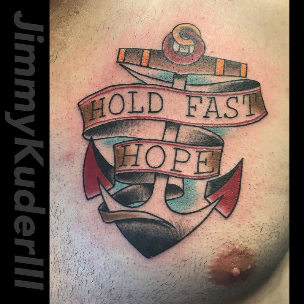 Traditional anchor tattoo with the inspiring phrase 'Hold Fast Hope' wrapped in bold banners