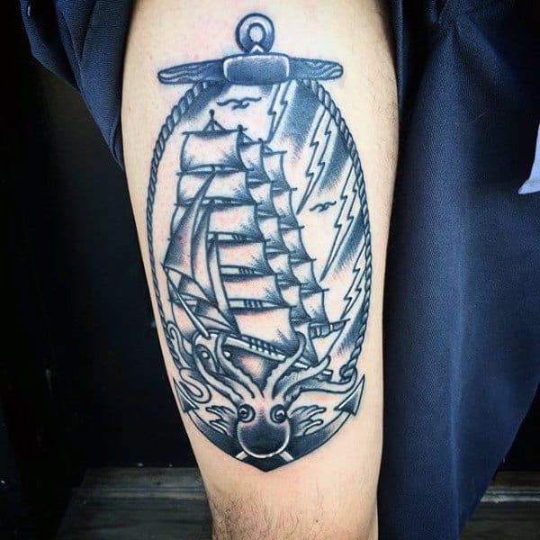 Tattoo of a sailing ship with tentacles and lightning bolts surrounded by an anchor